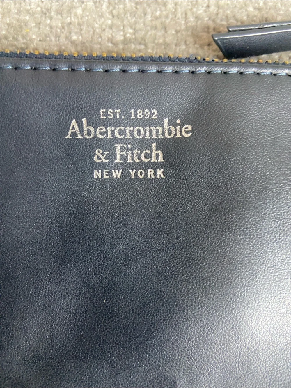 Abercrombie & Fitch Navy Pom-Pom Wristlet Clutch
